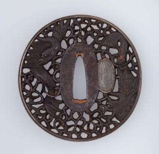 Tsuba with design of confronted dragons and arabesques