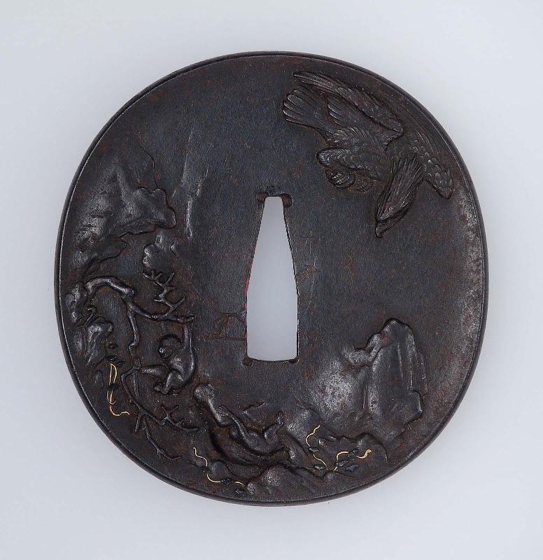 Tsuba with design of eagle swooping on a familiy of monkeys