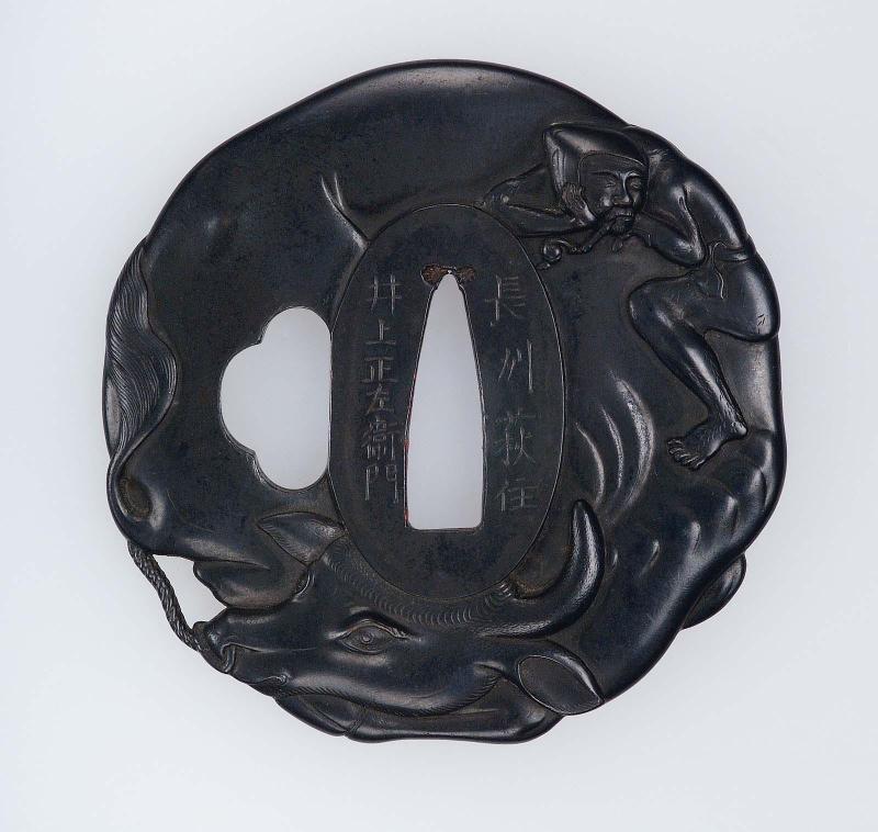 Tsuba in the form of a herdboy sleeping on his ox