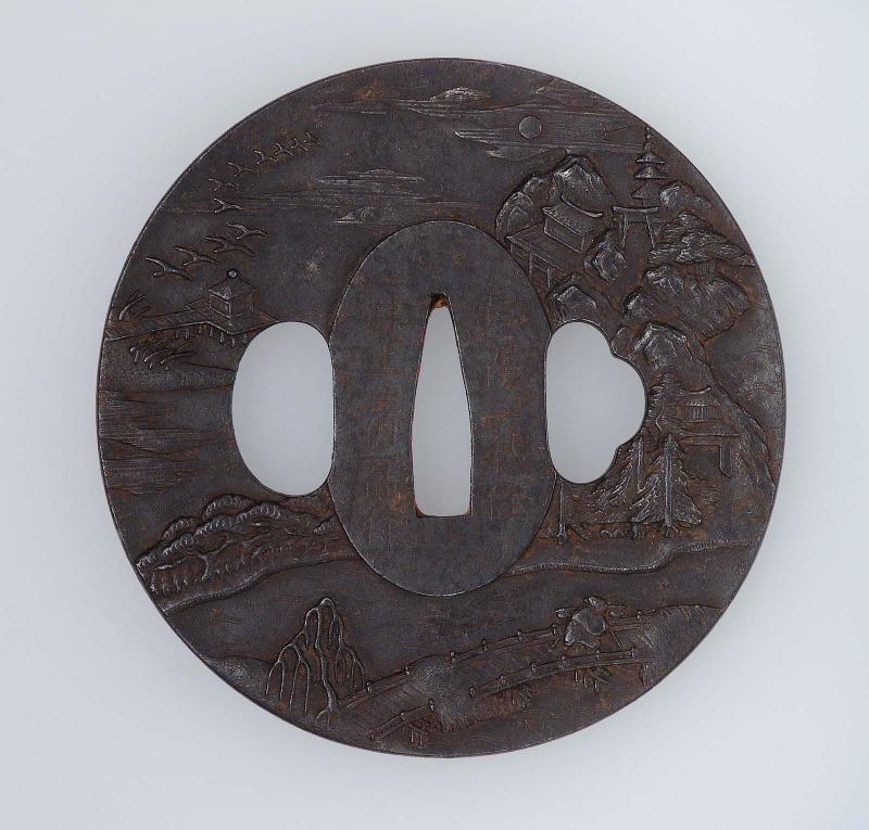 Tsuba with design of landscape with buildings, bridge, sea and descending geese
