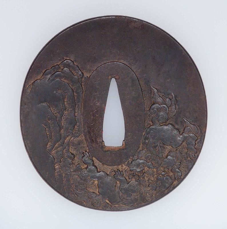 Tsuba with design of gamboling shishi
