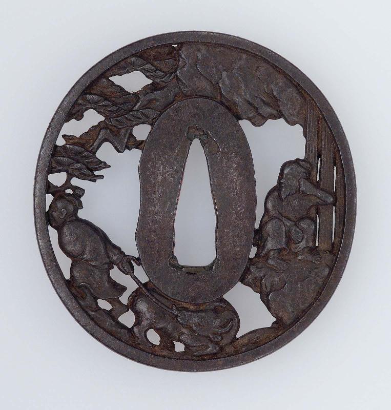 Tsuba with design of sage by a waterfall and another hauling an ox