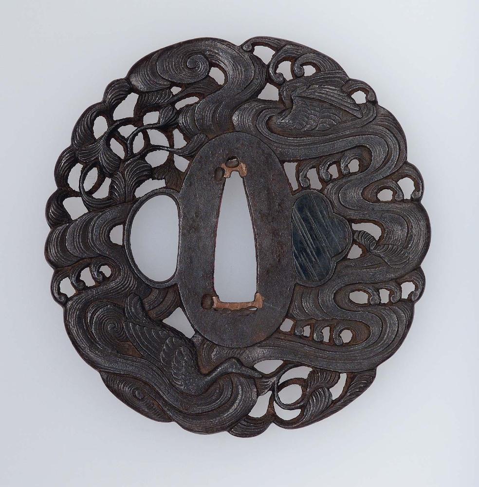 Tsuba with design of swimming ducks and waves