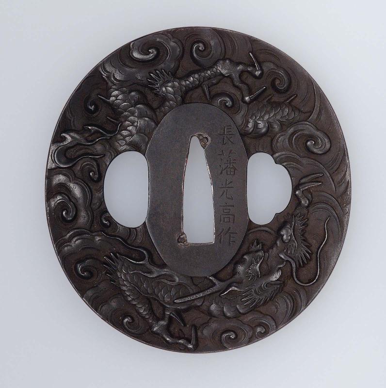 Tsuba with design of dragon and clouds