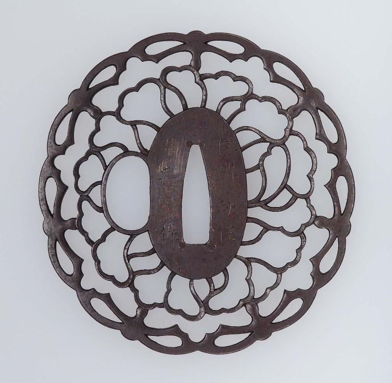 Tsuba with design of foliate ornament