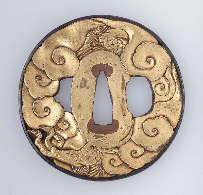 Tsuba with design of dragon and clouds