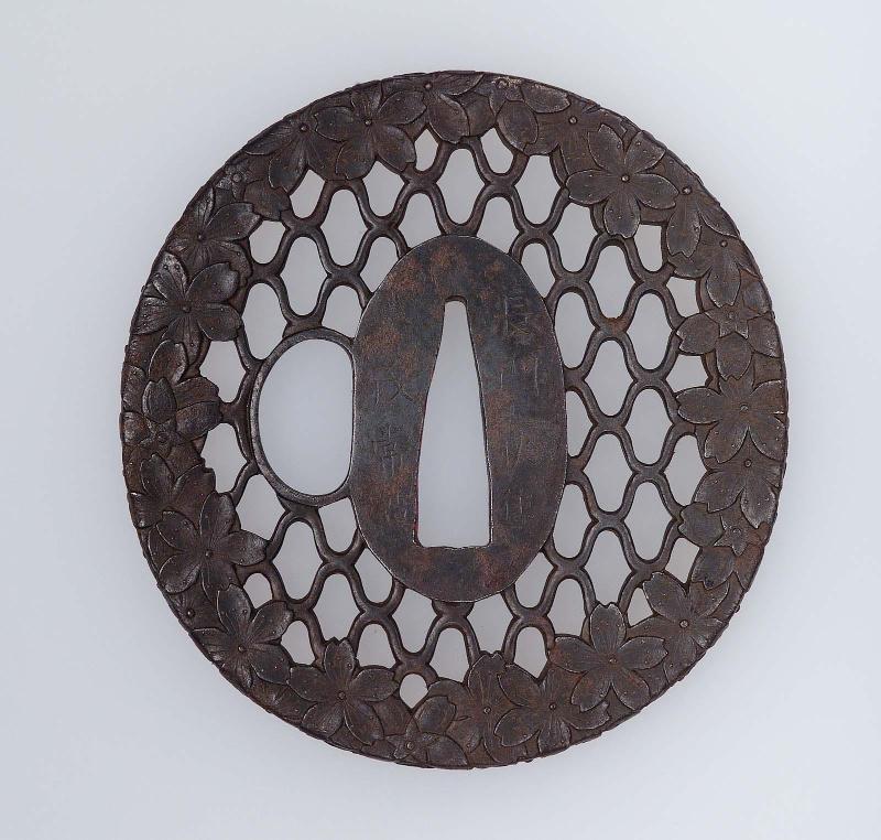 Tsuba with design of cherry-blossom and net pattern