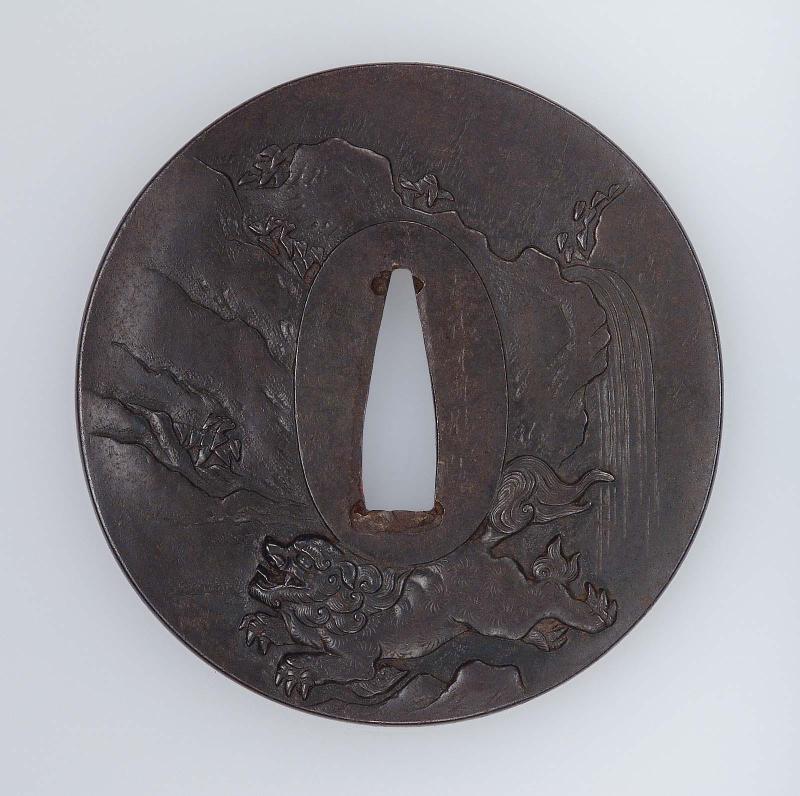 Tsuba with design of shishi and waterfall