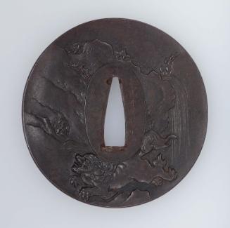 Tsuba with design of shishi and waterfall