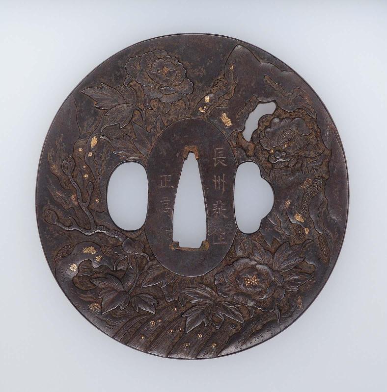Tsuba with design of shishi and peonies