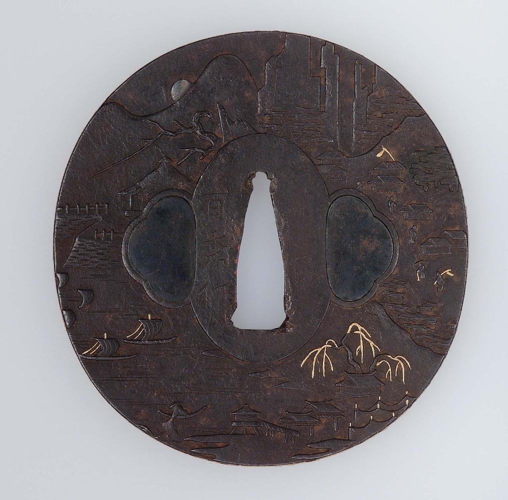 Tsuba with design of landscape with mountain and sailboats