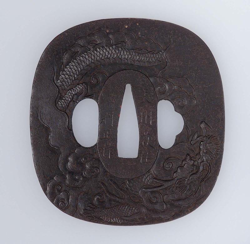 Tsuba with design of dragon and clouds