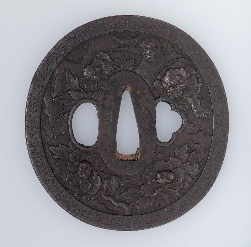 Tsuba with design of shishi and peonies