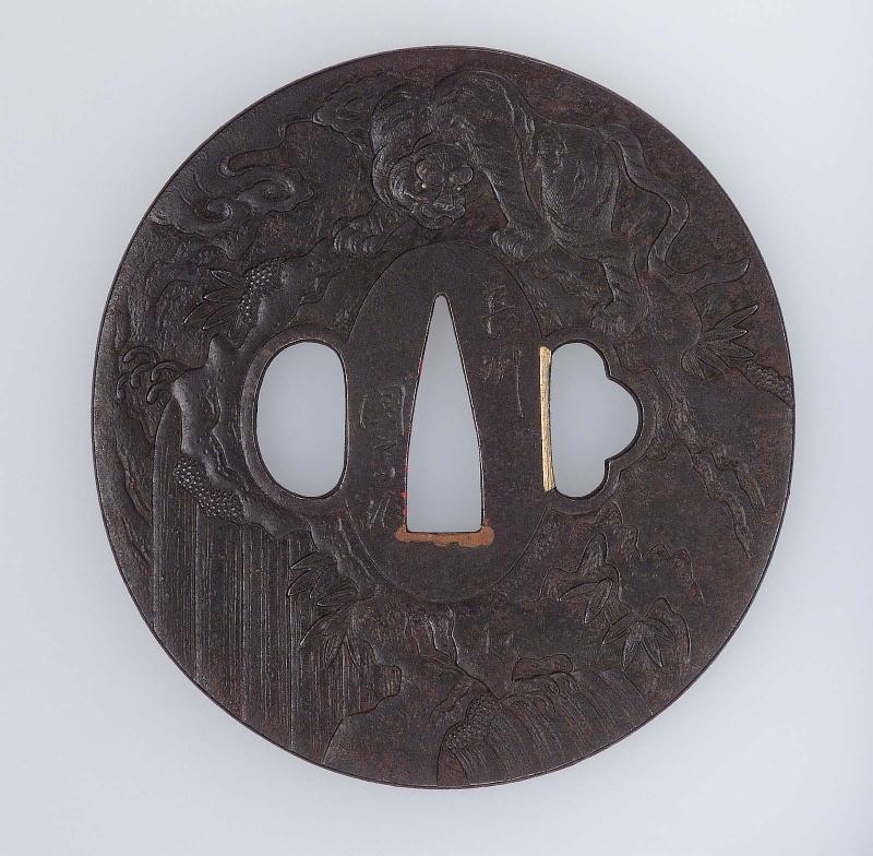 Tsuba with design of tiger and waterfall