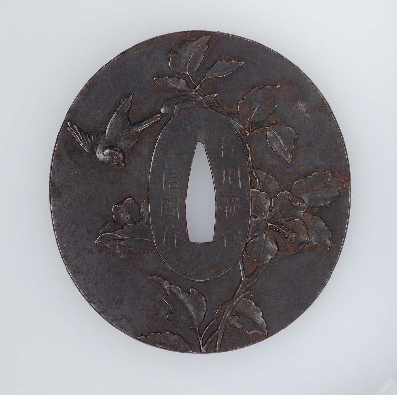 Tsuba with bird and flower design