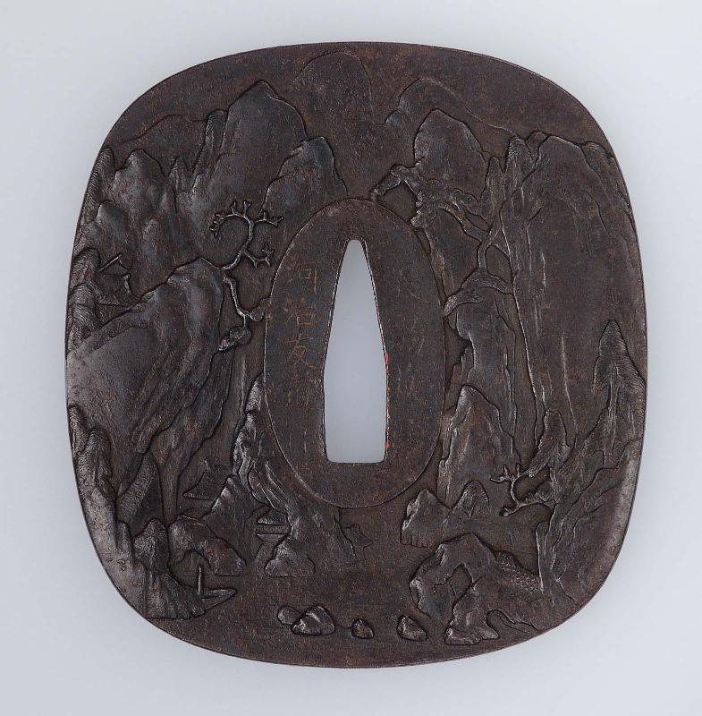 Tsuba with design of mountain landscape and horses and willow