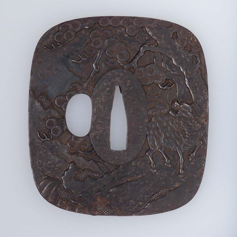 Tsuba with design of kirin and pine trees