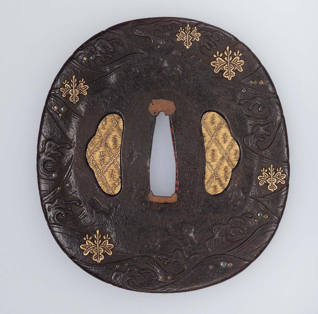 Tsuba with design of waves and paulownia mon