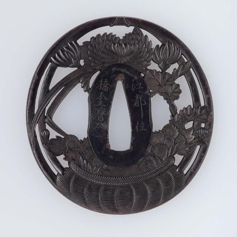 Tsuba with design of a basket of mixed chrysanthemums