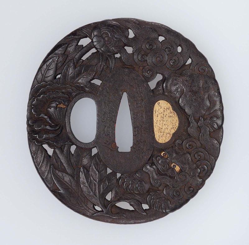 Tsuba with design of shishi and peonies