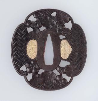 Tsuba with design of plum blossom and fence