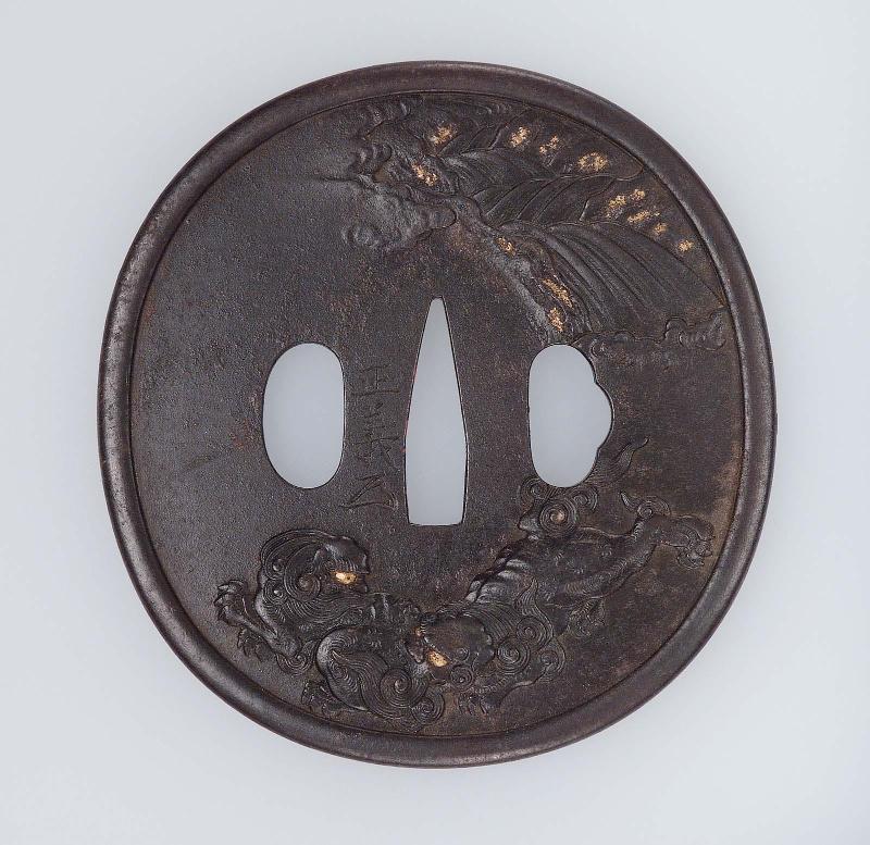 Tsuba with design of shishi, peonies and mountain torrent