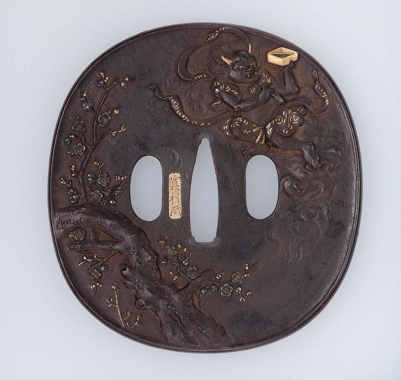 Tsuba with design of Kaisei, god of literature, and an ancient plum tree