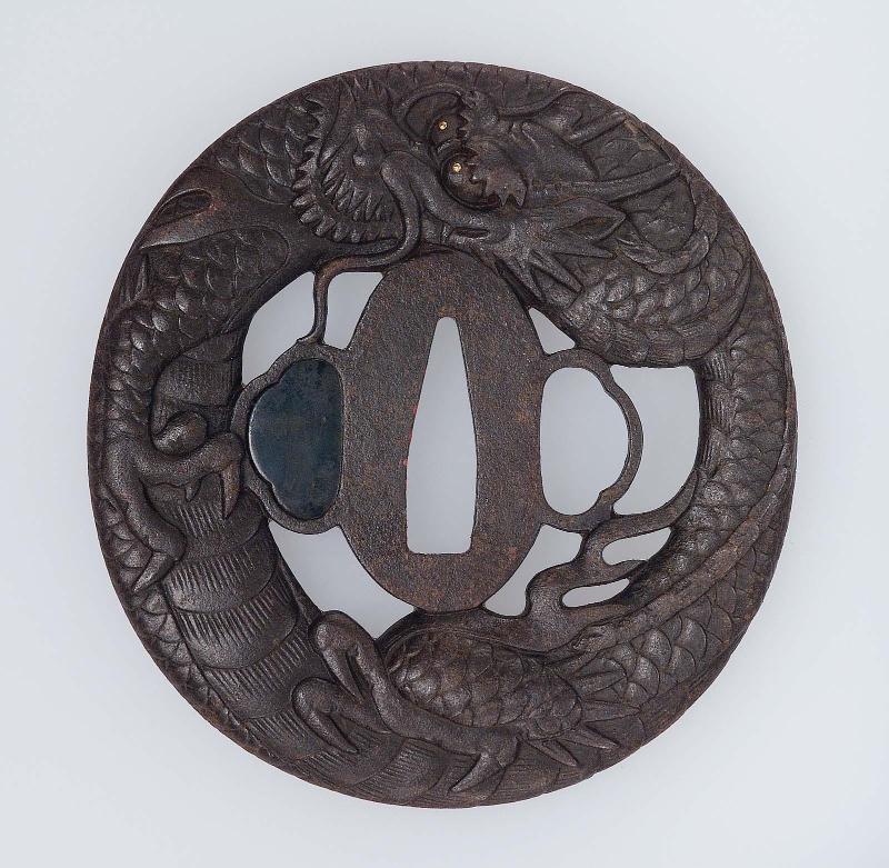 Tsuba with design of dragon and jewel
