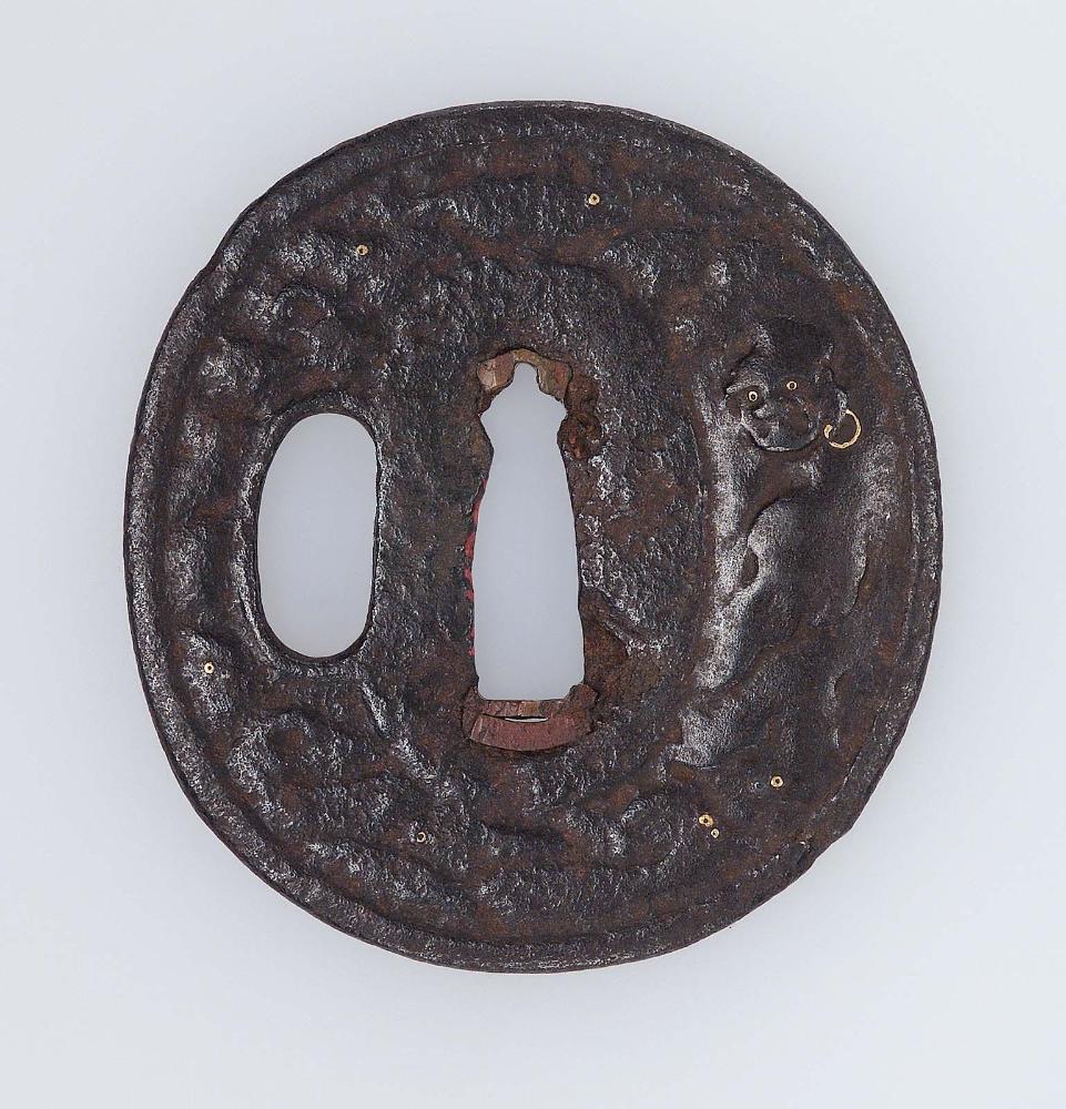 Tsuba with design of Daruma and waves