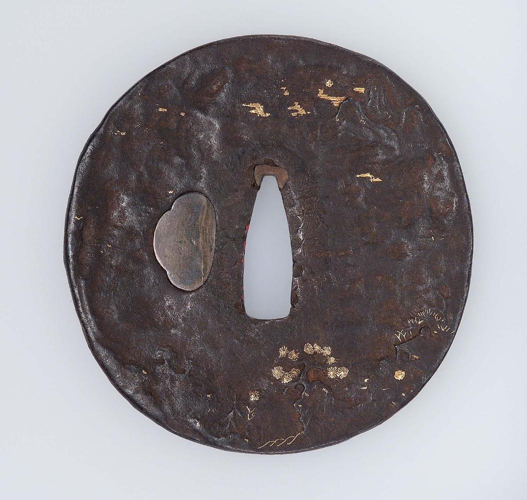 Tsuba with design of landscape with pines, crags, buildings and birds