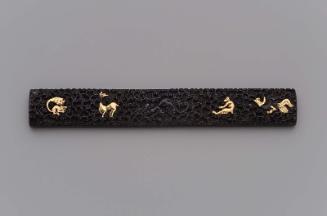 Kozuka with design of animals and plant scrolls