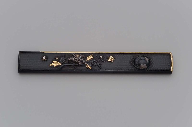 Kozuka with design of  sleeping cat, peony and butterflies