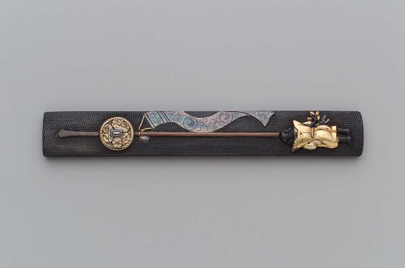 Kozuka with design of attendant and banner