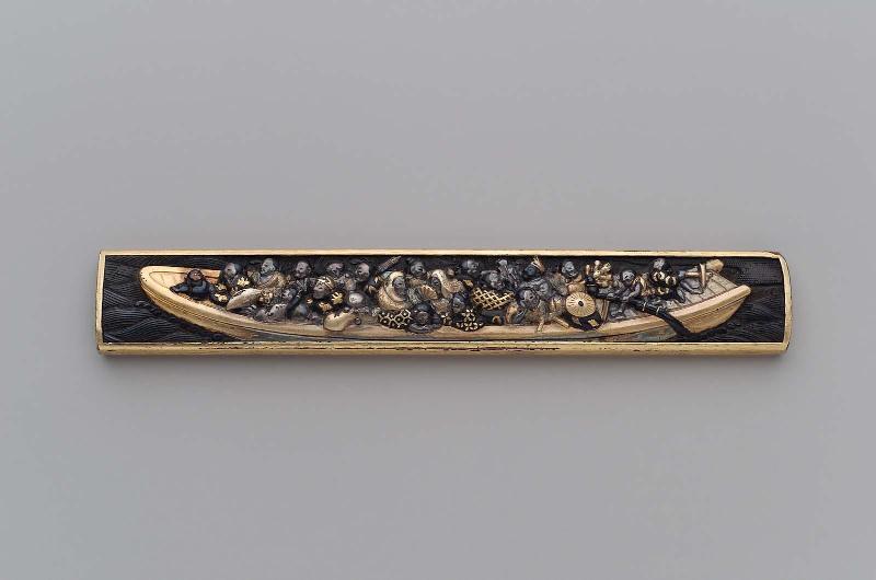 Kozuka with design of travelers in a ferry-boat