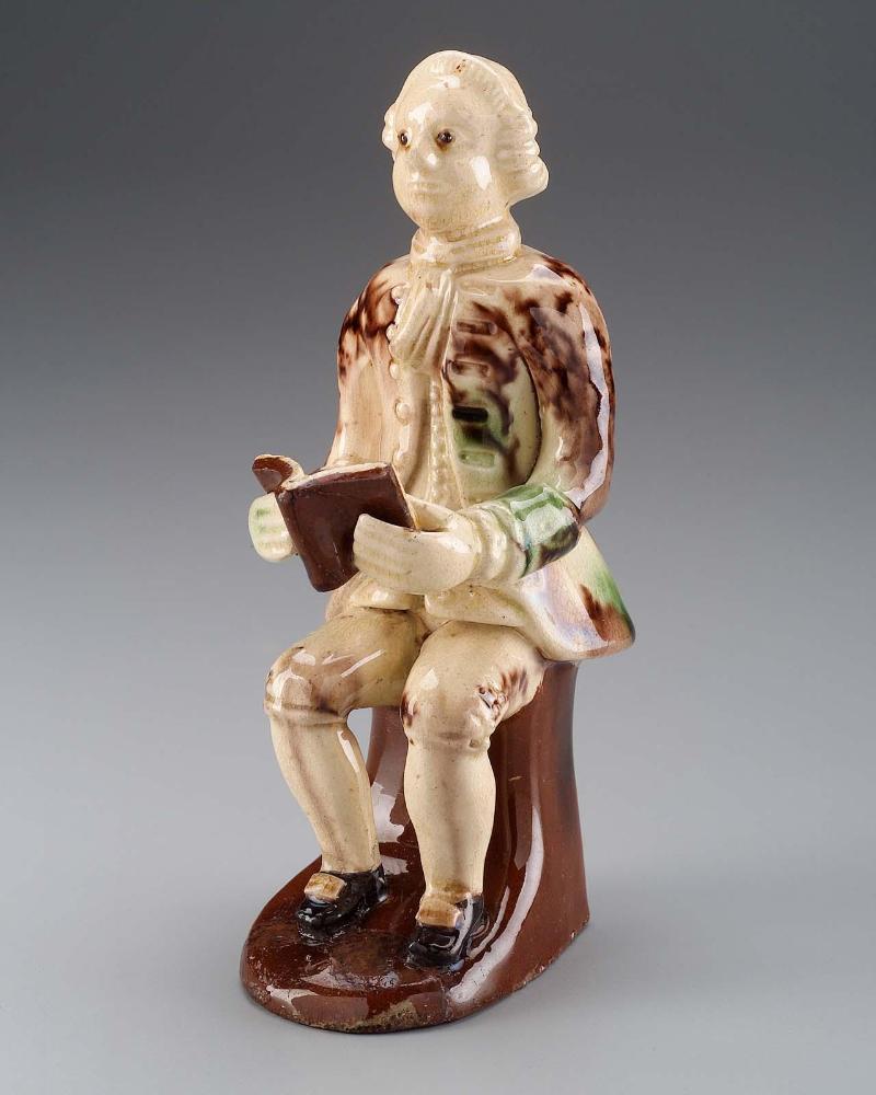 Figure of a Man Reading