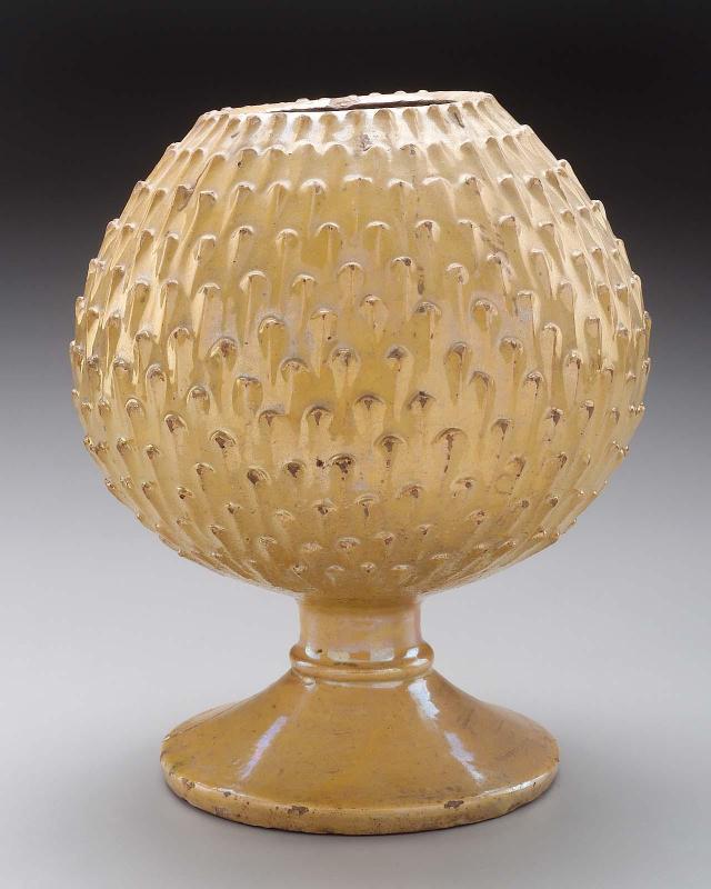Jar in the form of a pine cone