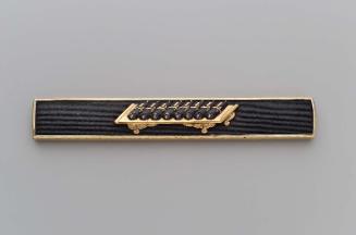 Kozuka with design of scrolls on a table