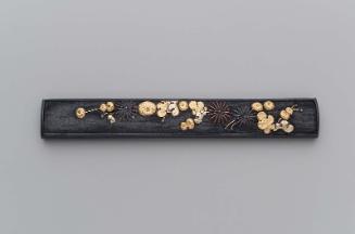 Kozuka with design of show chrysanthemums