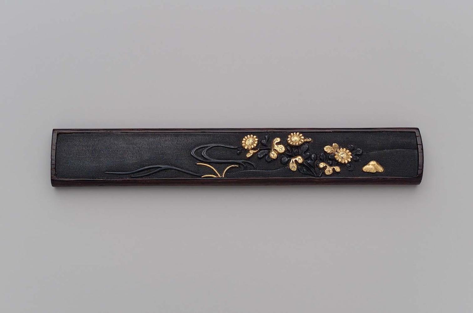 Kozuka with design of daisies by a stream