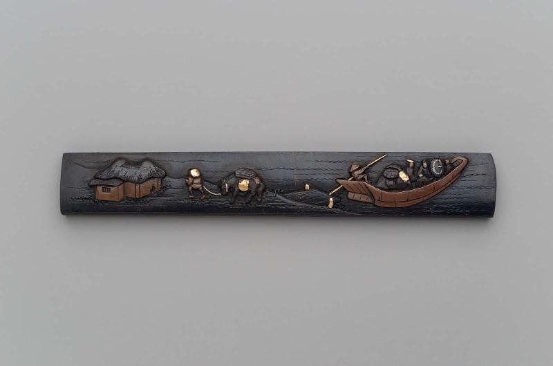 Kozuka with design of a ferryboat and a peasant leading a packhorse
