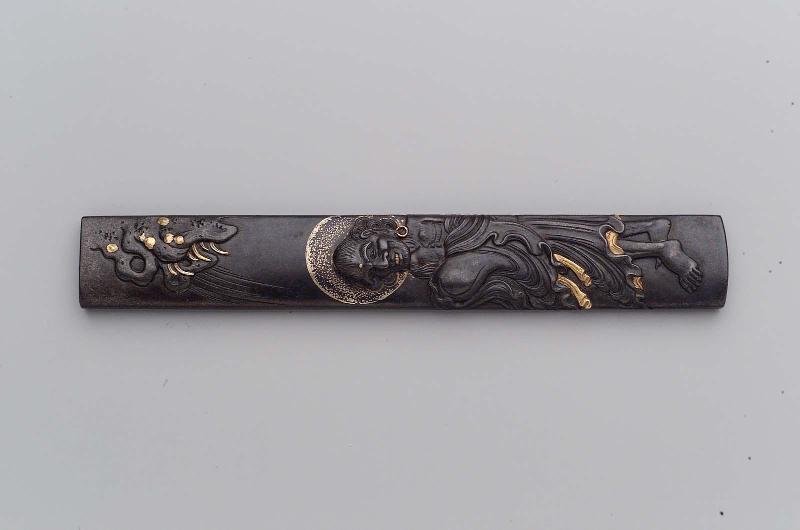 Kozuka with design of Mongaku Shonin standing under a waterfall