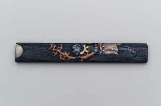 Kozuka with design of Koronbo holding a branch of coral