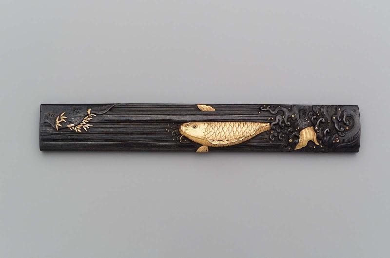 Kozuka with design of carp leaping up a waterfall