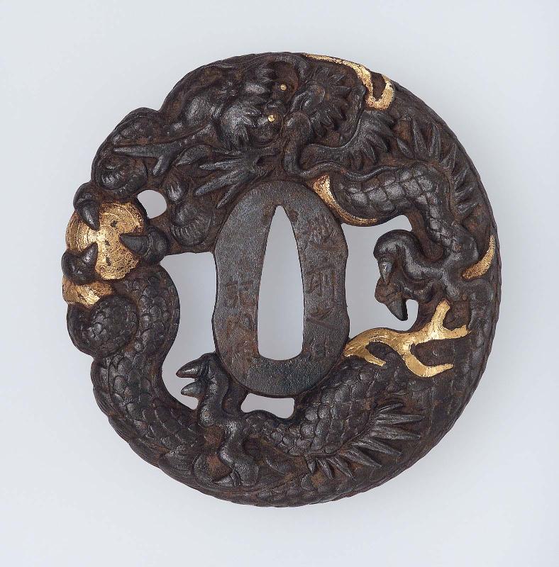 Tsuba with design of dragon and jewel