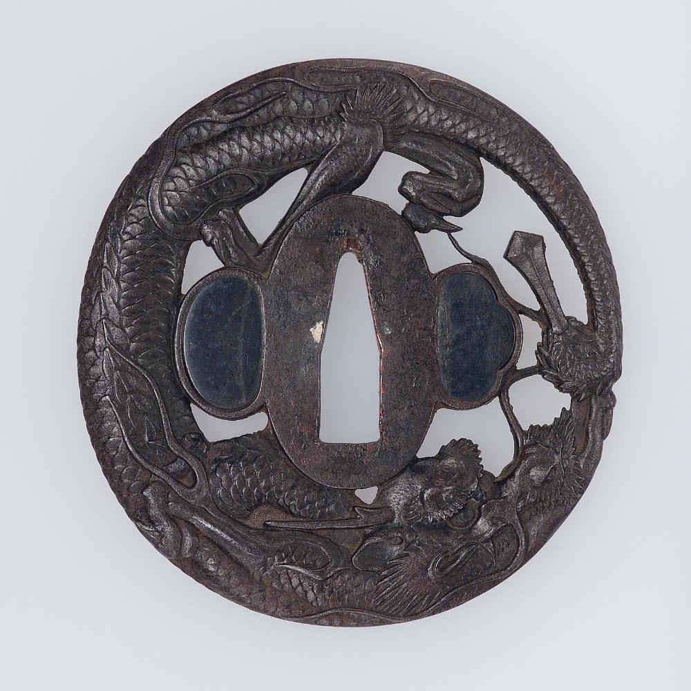 Tsuba with design of dragon and sword