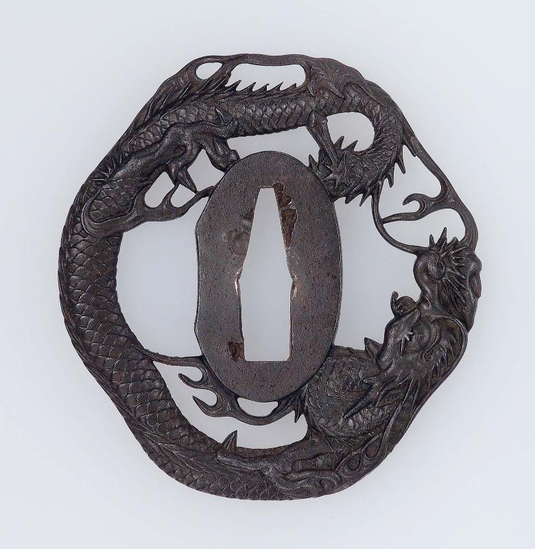 Tsuba with design of dragon and sword