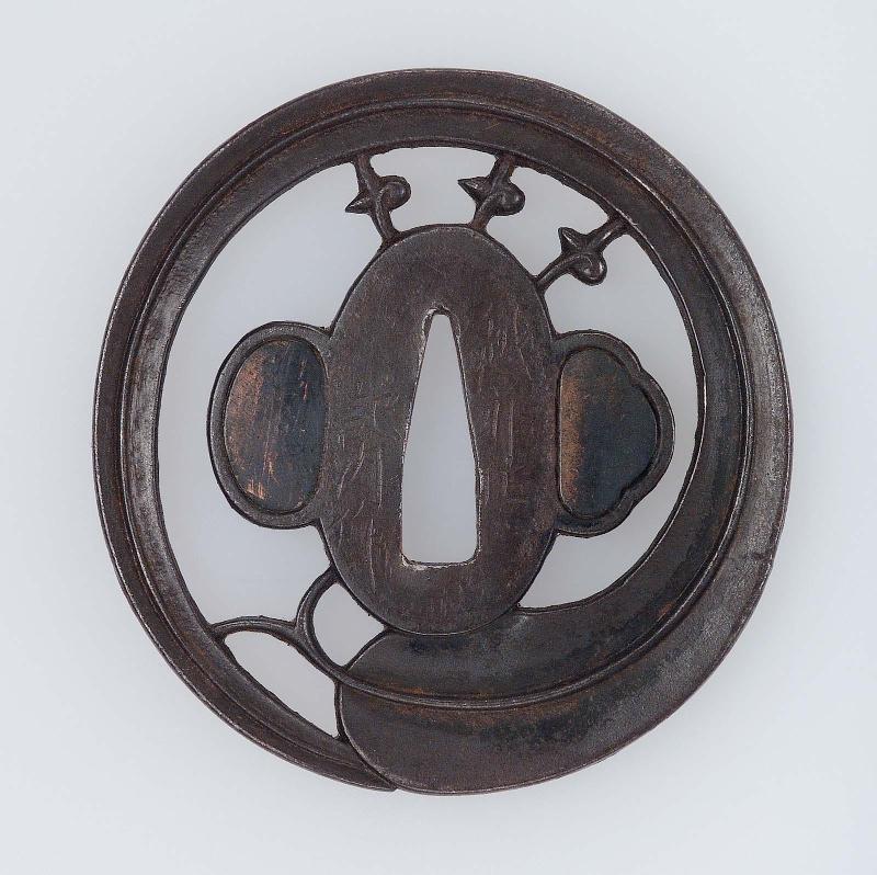 Tsuba with design of a single bamboo leaf