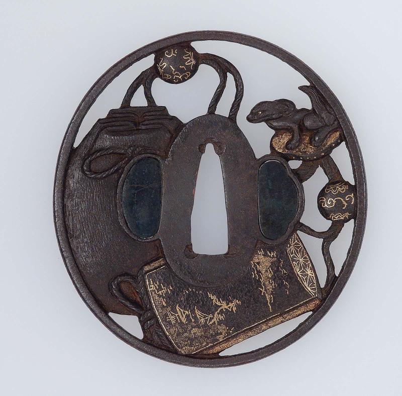 Tsuba with design of inro, tobacco-pouch, ojime and netsuke