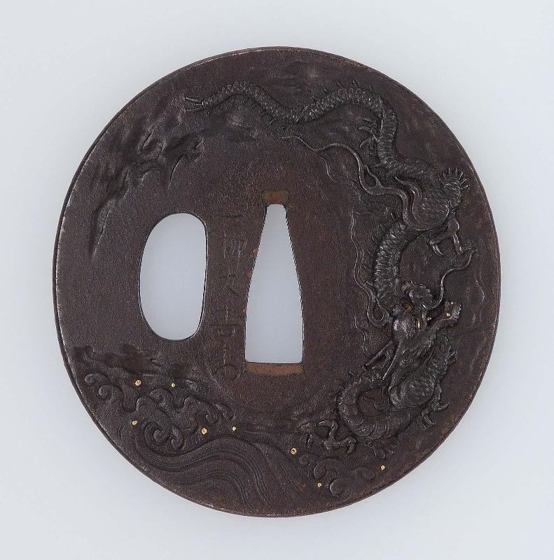 Tsuba with design of Shoki capturing an oni