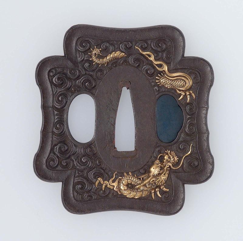 Tsuba with design of dragon and clouds